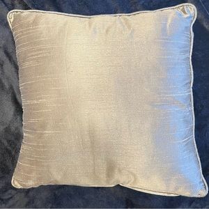 Two bronze throw pillows. 18x18 inches. Fabric has slub texture and soft…